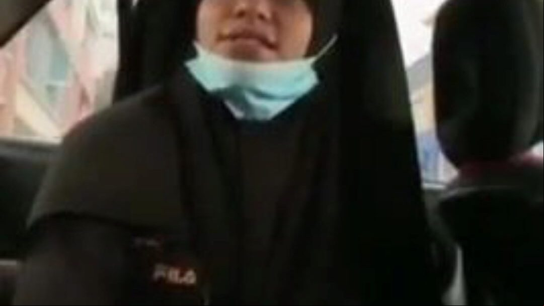 Tudung in a car providing deep throat and riding
